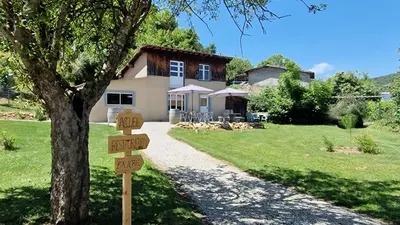 a sign in front of a house at Dortoir Gîte d'étapes 