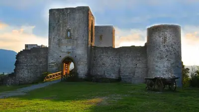 an old castle with a bench in front of it at Chalet 