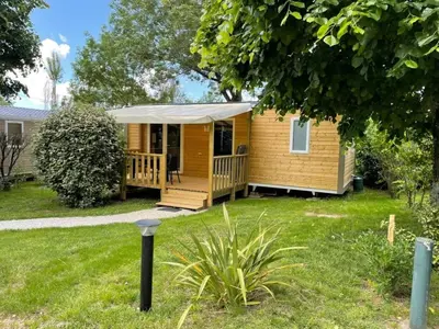 a bathroom with a glass shower and a window at Camping 3 étoiles - ccaaafd in Sorèze