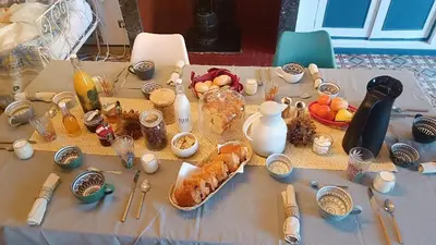 a table with a bunch of food on it at A L' Estiu in Latour-de-France
