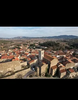 an aerial view of a city with buildings at A L' Estiu in Latour-de-France