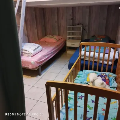 a bedroom with two bunk beds at Charmant T3 de 65 m2 in Port-la-Nouvelle