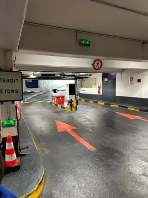 an empty parking garage with an empty parking lot at L impasse d'Anaïs Free Parking in Carcassonne
