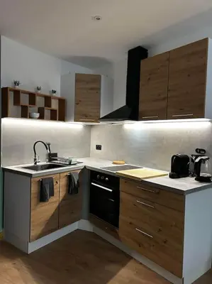 a kitchen with a sink and a stove at Studio les Rosiers in Quillan