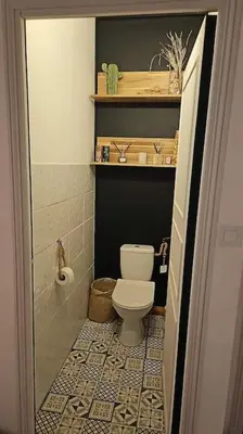 a small bathroom with a toilet and a sink at Hébergement - Canal du midi in Saint-Martin-Lalande
