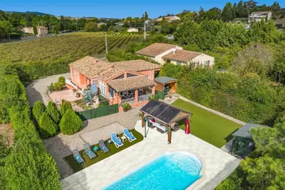 an aerial view of a house with a swimming pool at Villa de lOrmeau by Villa Plus in Cambieure