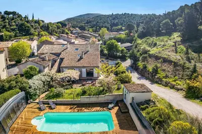 an aerial view of a house with a swimming pool at Villa Fraisse by Villa Plus in Fraissé-des-Corbières