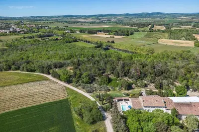 an aerial view of a farm with a house and a road at Villa Domaine Saint Roch by Villa Plus in Gaja-et-Villedieu