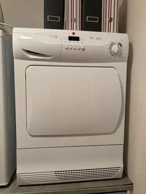 a white oven sitting next to a wall at Villa Les amandiers avec piscine in Saint-Laurent-de-la-Cabrerisse