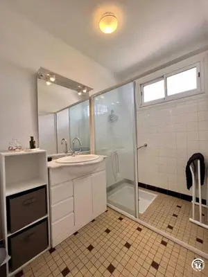a bathroom with a shower and a sink at La sapinette in Quillan