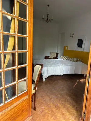 a bedroom with a bed and a room with a window at Gîte les Mercieres la Villa Maison campagne grands espaces oasis de nature, convivialité, détente 5 Chambres piscine chauffée Wifi piano billard in Pexiora