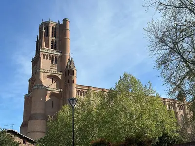 a large building with a tower on top of it at Le repaire du châtaignier, Maison à la campagne, 8 pers, 4 ch, Sidobre in Ferrières