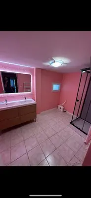 a kitchen with a tile floor and a kitchen with a window at Hotel Castres Chambre Simple in Castres