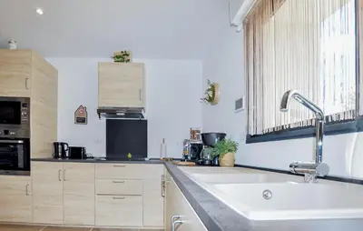 a kitchen with a sink and a counter top at 4 Bedroom Gorgeous Home In Tournissan in Tournissan