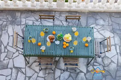 an overhead view of a table with fruit on it at Maison Jade - Villa avec piscine - Barbecue - Calme in Narbonne