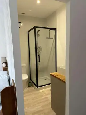 a bathroom with a shower and a toilet at La Pause Bonheur - L'occitane in Luc-sur-Orbieu