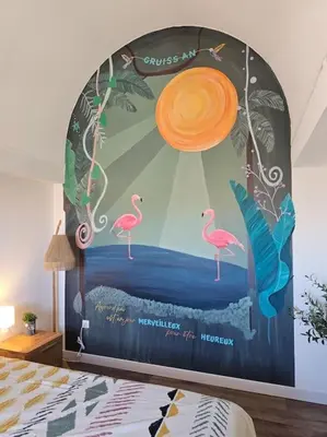 a bedroom with a large bed with a painting on the wall at Charmant Duplex, Ambiance Nature avec vue sur les bateaux in Gruissan