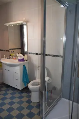 a bathroom with a toilet and a sink and a shower at Family Friendly Gite in Quillan in Quillan