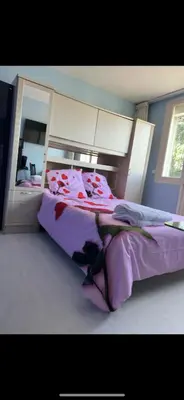 a bedroom with a bed and a mirror at Hotel Castres Chambre Simple in Castres