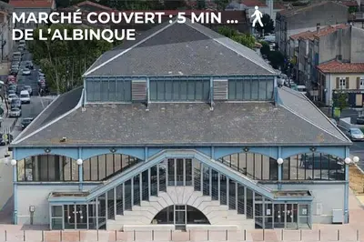 a large building with a gray roof and windows at Le Baroque - Grand T2 Confort, Lit Queen Size in Castres