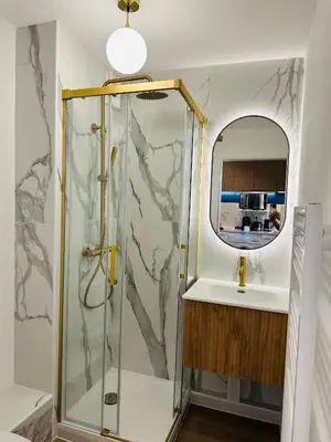 a bathroom with a shower and a mirror at You&Me hyper centre ville avec draps serviettes ménage final in Narbonne