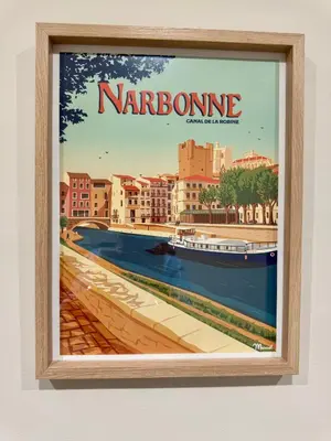 a framed picture of a river in a city at Appartement de luxe à deux pas des Halles, quai Valliere in Narbonne