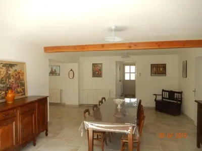 a dining room with a table and chairs at GITE Le calme de la campagne plus le confort in Viviès