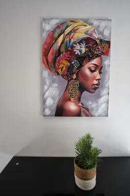 a painting of a woman wearing a turban at Loft de caractère centre-ville in Narbonne
