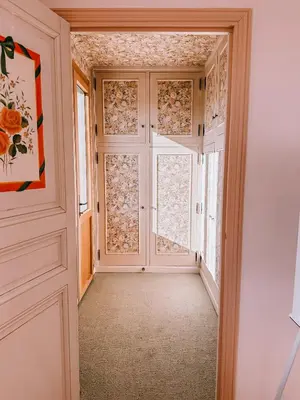 an empty hallway with doors and windows at LV House & Gardens in Carcassonne