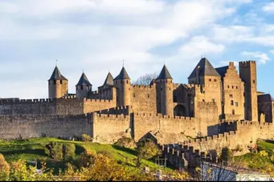 a large castle on top of a hill at 
