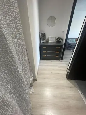 a room with a hallway with a dresser and a window at Palma Studio bis 4 pers - 100m plage in Port-la-Nouvelle