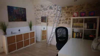 a room with a room with a desk and a mirror at La Félicita - Gîte de charme proche de Narbonne in Moussan