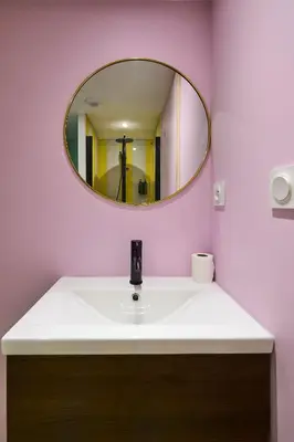 a bathroom with a white sink and a mirror at La Villa Orange - Instagood - proche cité médiévale et centre ville à pied in Carcassonne