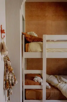a bunk bed with two bunk beds in a room at Pausette in Fanjeaux