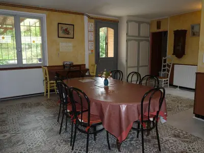 a bathroom with a sink and a toilet at Gîte de Lamourade in Saint-Ferriol