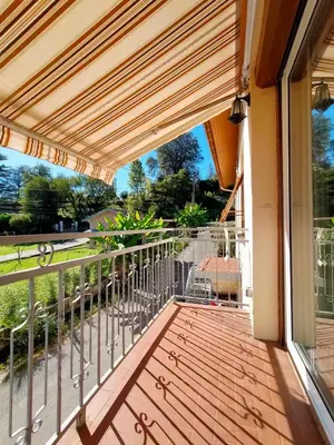 a balcony of a house with a view at L'Écrin de Pamiers - Appt climatisé pour 6 in Pamiers