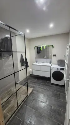 a bathroom with a shower and a sink at l'instant cosy in Tuchan