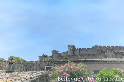 a castle on top of a stone wall at Les Bellevue Cité Trivalle 