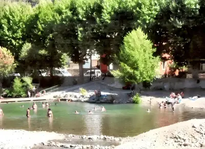 a group of people swimming in a river at Maison intime à Pouzols-Minervois avec jardin et parking in Pouzols-Minervois
