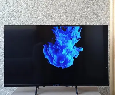 a television screen with blue smoke on it at Sun Of Gruissan in Gruissan