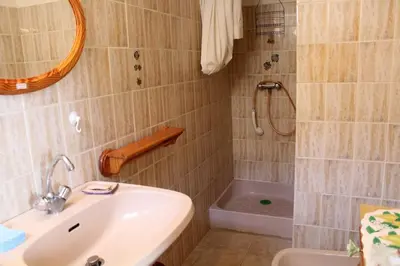 a bathroom with a sink and a shower at Maison Studio mezz 2 couchages PORT LA NOUVELLE PN000-201 in Port-la-Nouvelle