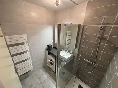 a bathroom with a shower and a sink at Appartement deux pièces Port la Nouvelle PN015-017 in Port-la-Nouvelle