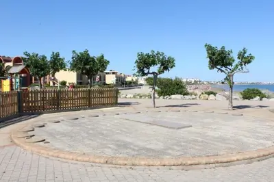 a large circle in the middle of a sidewalk at Appartement avec parking privé proche de la plage GN250-089 in Gruissan