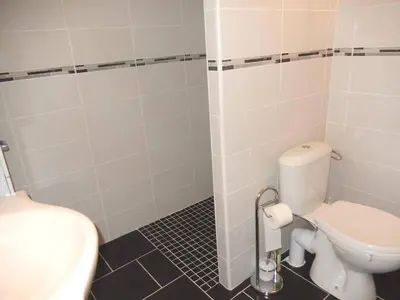 a bathroom with a toilet and a sink at Maison 3 pièces PORT LA NOUVELLE PN500-005 in Port-la-Nouvelle