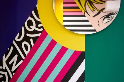 a close up of a collage of different colored ties at La Villa Orange - POP'ART - proche cité médiévale et centre ville à pied in Carcassonne