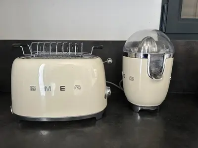 two toasters sitting next to each other on a counter at La Maison Laurier in Lézignan-Corbières