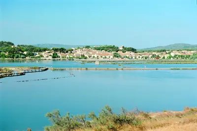 a large body of water with a town in the background at Azureva Sigean in Sigean