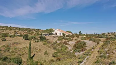 a house on the side of a hill at Domaine Castelsec in Roquefort-des-Corbières