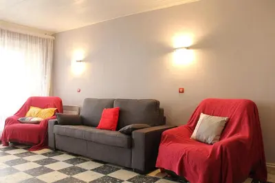 a living room with a couch and two chairs at Appartement 3 pièces PORT LA NOUVELLE PN540-008 in Port-la-Nouvelle