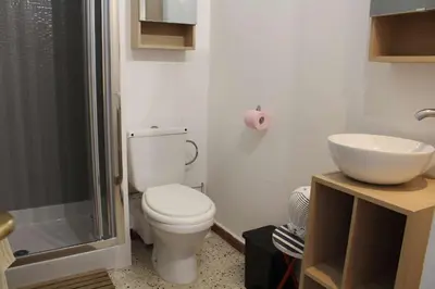 a bathroom with a toilet and a sink at Appartement studio PORT LA NOUVELLE PN590-014 in Port-la-Nouvelle